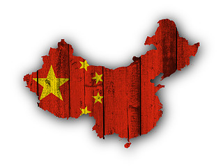 Image showing Map and flag of China on weathered wood