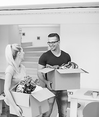 Image showing young couple moving into a new home