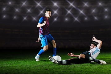 Image showing football players in competition for the ball