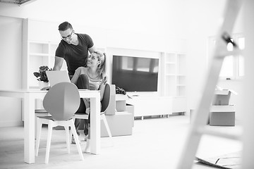 Image showing Young couple moving in a new home