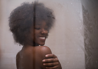 Image showing African American woman in the shower