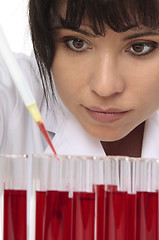 Image showing Pathologist takes sample for testing