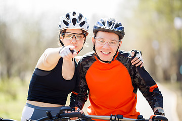 Image showing Portrait of couple on bicycles