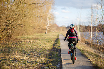 Image showing Park and girl on bicycle