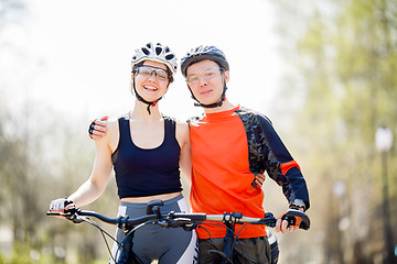 Image showing Photo of athletes with bicycles