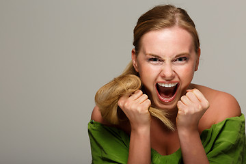 Image showing Screaming model with bare shoulders