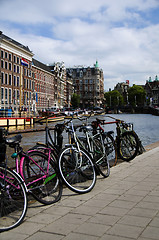 Image showing bicycles on the canal amsterdam holland