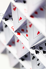 Image showing house of playing cards over white background