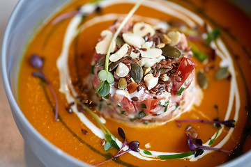 Image showing close up of vegetable pumpkin-ginger soup in bowl