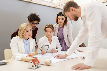 Image showing business team discussing house project at office