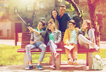 Image showing happy teenage students taking selfie by smartphone