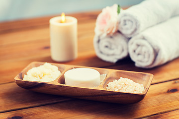 Image showing close up of soap, himalayan salt and scrub in bowl