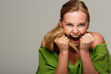 Image showing Screaming model in green dress