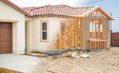 Image showing Transition of New Home From Framing To Completion