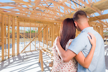 Image showing Young Military Couple On Site Inside Their New Home Construction