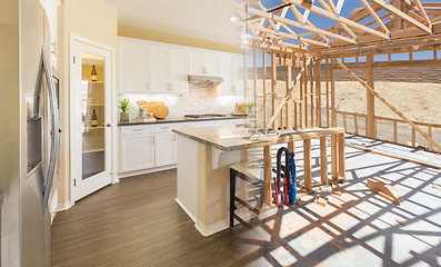 Image showing Transition of Beautiful New Home Kitchen From Framing To Complet