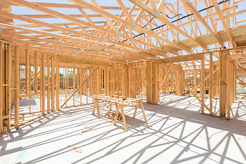 Image showing Wood Home Framing Abstract At Construction Site.