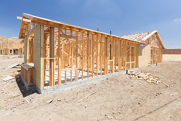 Image showing Wood Home Framing Abstract At Construction Site.