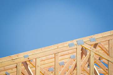 Image showing Wood Home Framing Abstract At Construction Site.