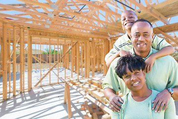 Image showing Young African American Family On Site Inside Their New Home Cons