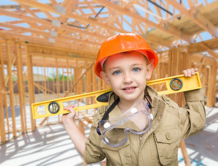 Image showing Young Boy Contractor With Level On Site Inside New Home Construc