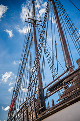 Image showing Old collapsing sailboats at the dock, close-up