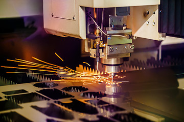 Image showing CNC Laser cutting of metal, modern industrial technology.