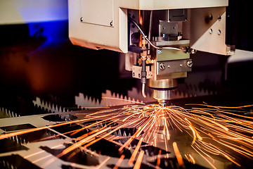 Image showing CNC Laser cutting of metal, modern industrial technology.