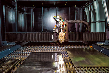 Image showing CNC Laser cutting of metal, modern industrial technology.