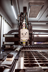 Image showing CNC Laser cutting of metal, modern industrial technology.