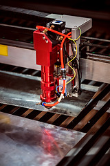 Image showing CNC Laser cutting of metal, modern industrial technology.