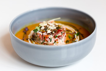 Image showing close up of vegetable pumpkin-ginger soup in bowl