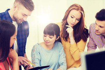 Image showing creative team with tablet pc at office