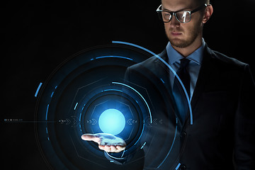 Image showing close up of businessman with virtual projection