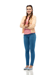 Image showing happy smiling young woman in cardigan and jeans