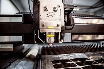 Image showing CNC Laser cutting of metal, modern industrial technology.