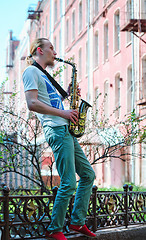 Image showing Young Man Plays Sax