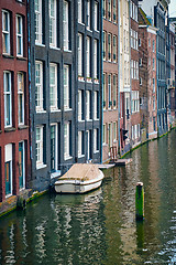Image showing Amsterdam canal Damrak with houses, Netherlands