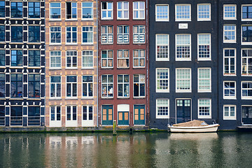 Image showing Amsterdam canal Damrak with houses, Netherlands