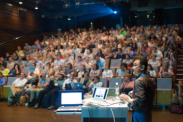 Image showing Public speaker giving talk at Business Event.