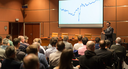 Image showing Business speaker giving a talk in conference hall.