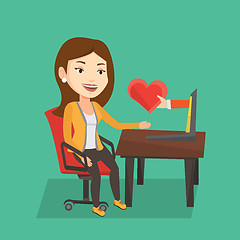 Image showing Young woman dating online using laptop.