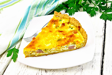 Image showing Quiche with pumpkin and bacon in plate on light board