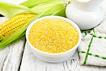 Image showing Corn grits in bowl on light board