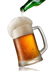 Image showing Beer pouring into mug