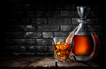 Image showing Whiskey and brick wall