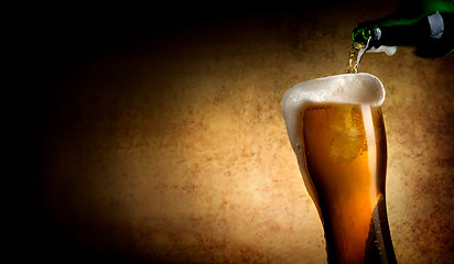 Image showing Beer pouring into glass