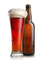 Image showing Red beer and bottle