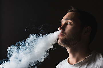 Image showing The face of vaping young man