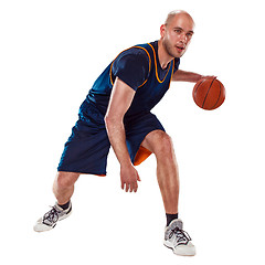 Image showing Full length portrait of a basketball player with ball